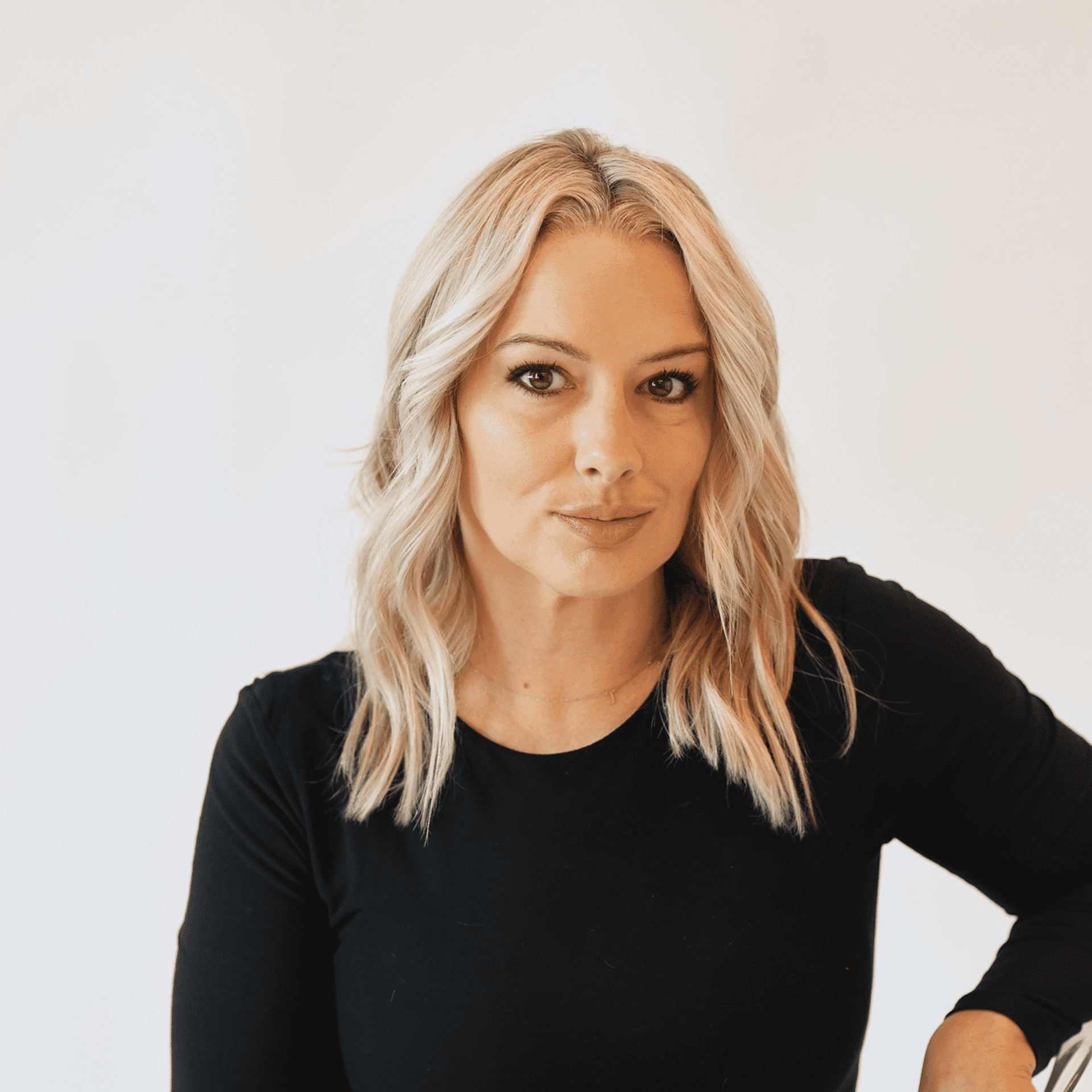 Portrait of Danielle Deprey, a professional stylist at AILISH & ASTON SALON AND SPA, showcasing their expertise and style.