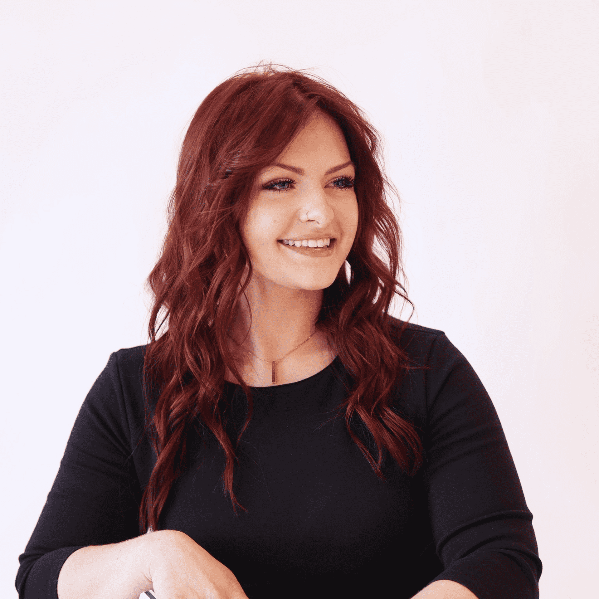Portrait of Samantha Areseneau, a professional stylist at AILISH & ASTON SALON AND SPA, showcasing their expertise and style.