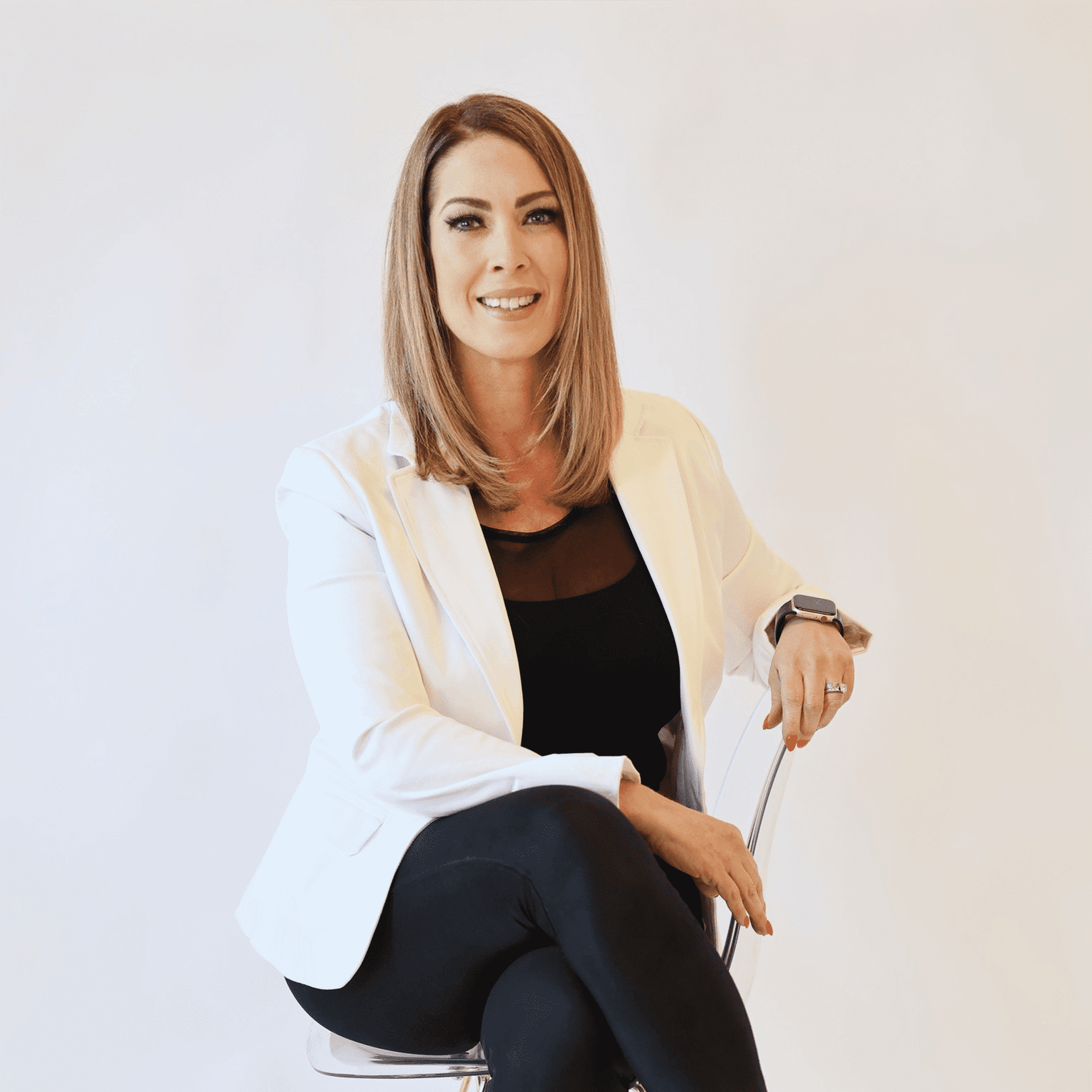 Portrait of Heather Swanson, a professional stylist at AILISH & ASTON SALON AND SPA, showcasing their expertise and style.